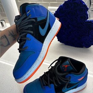 Blue Black and Orange High-Top Nike 1’s